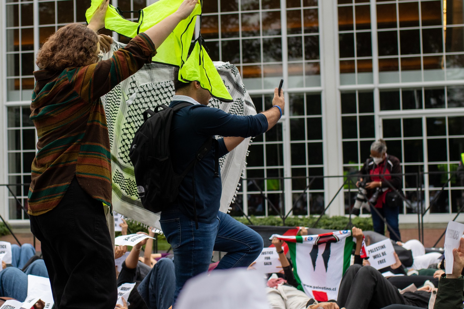 Marshals at an Oct. 18 pro-Palestine "die-in" demonstration attempted to block the camera of a Harvard Business School student who was filming protesters' faces.