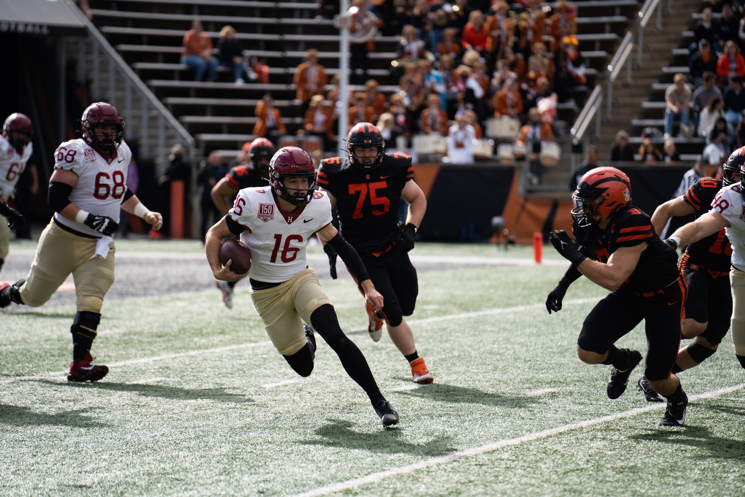Junior quarterback Charles Deprima looks to escape the Princeton defense on October 21, 2023.