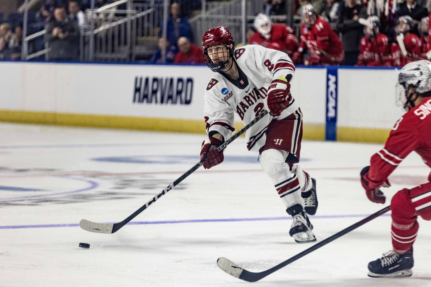Then-sophomore defenseman Ian Moore makes a pass against Ohio State in the first round of the NCAA Tournament on March 24, 2023.